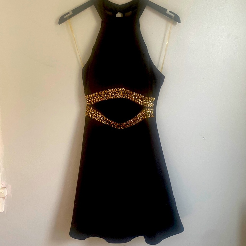 Emerald Sunshine black crepe homecoming dress. Gold rhinestone detail-open waist